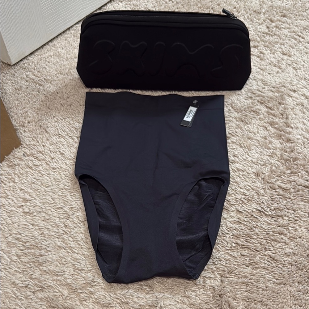 SKIMS Black Briefs with Matching Pouch